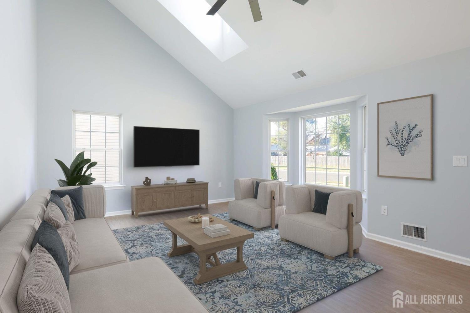 4 Ellison Court Keyport, NJ 07735 - Photo 4 of 37 a living room with furniture and a flat screen tv
