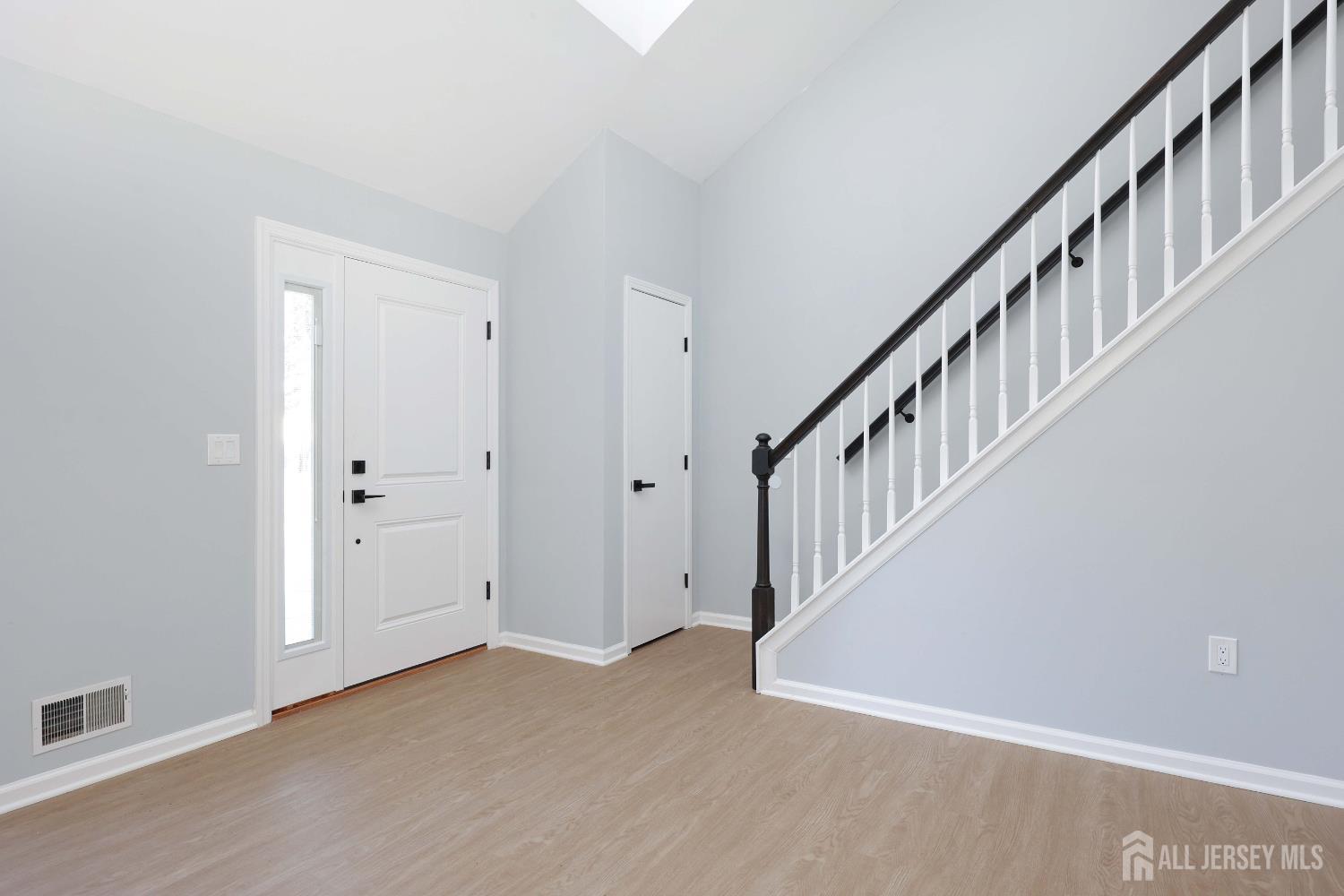 4 Ellison Court Keyport, NJ 07735 - Photo 6 of 37 a view of an entryway with wooden floor
