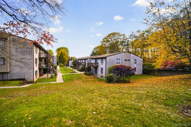 a view of an chairs in front of house