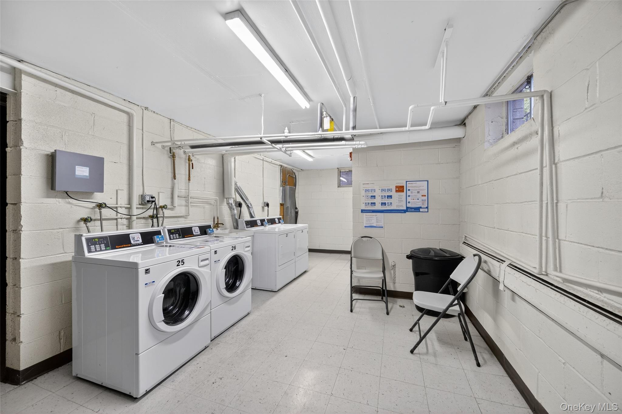 10 Secora Road, Unit L12 Monsey, NY 10952 - Photo 17 of 24 a utility room with dryer and washer