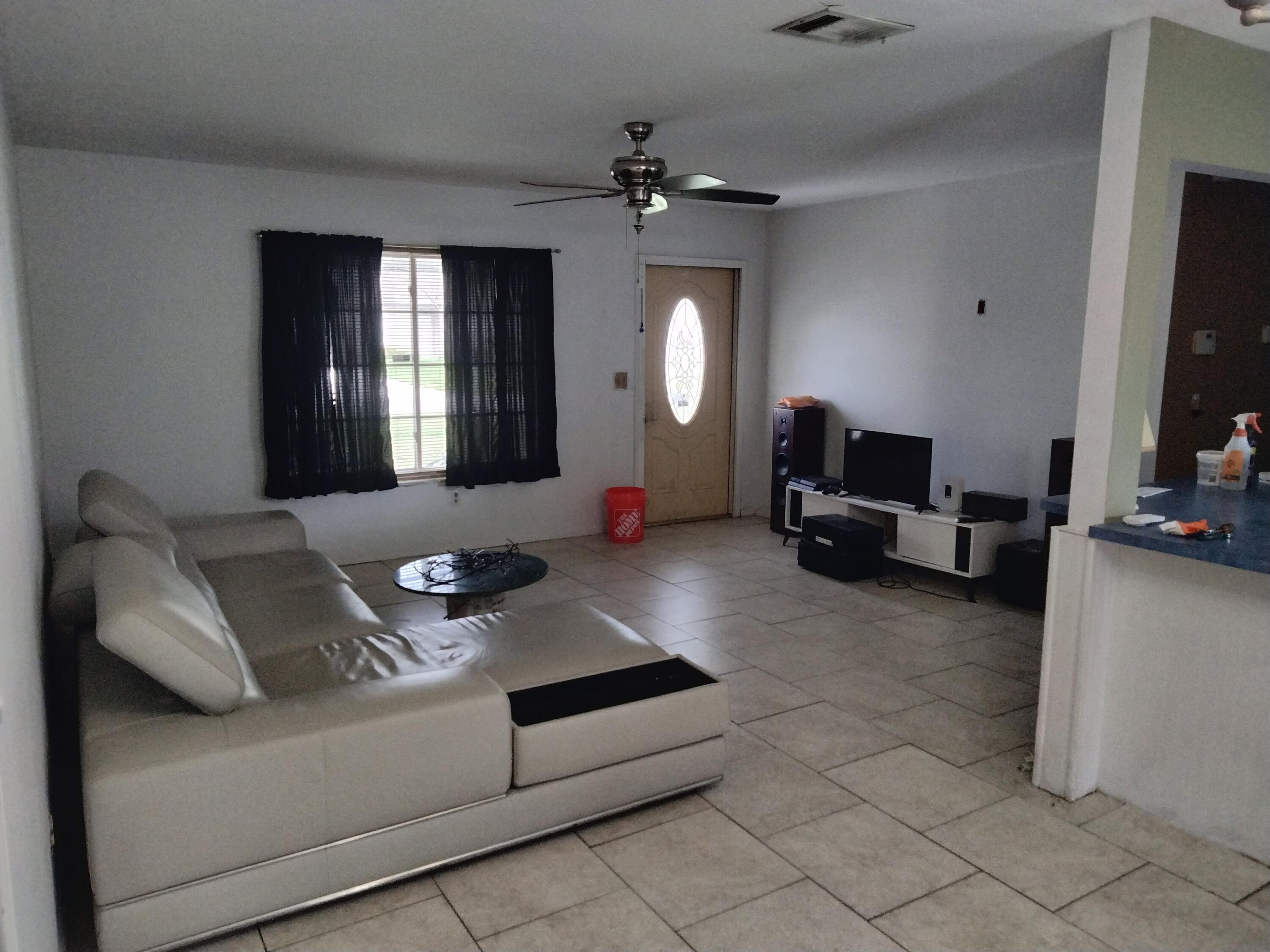 2342 Southeast Midtown Road Port St. Lucie, FL 34952 - Photo 10 of 12 Midtown Living Room