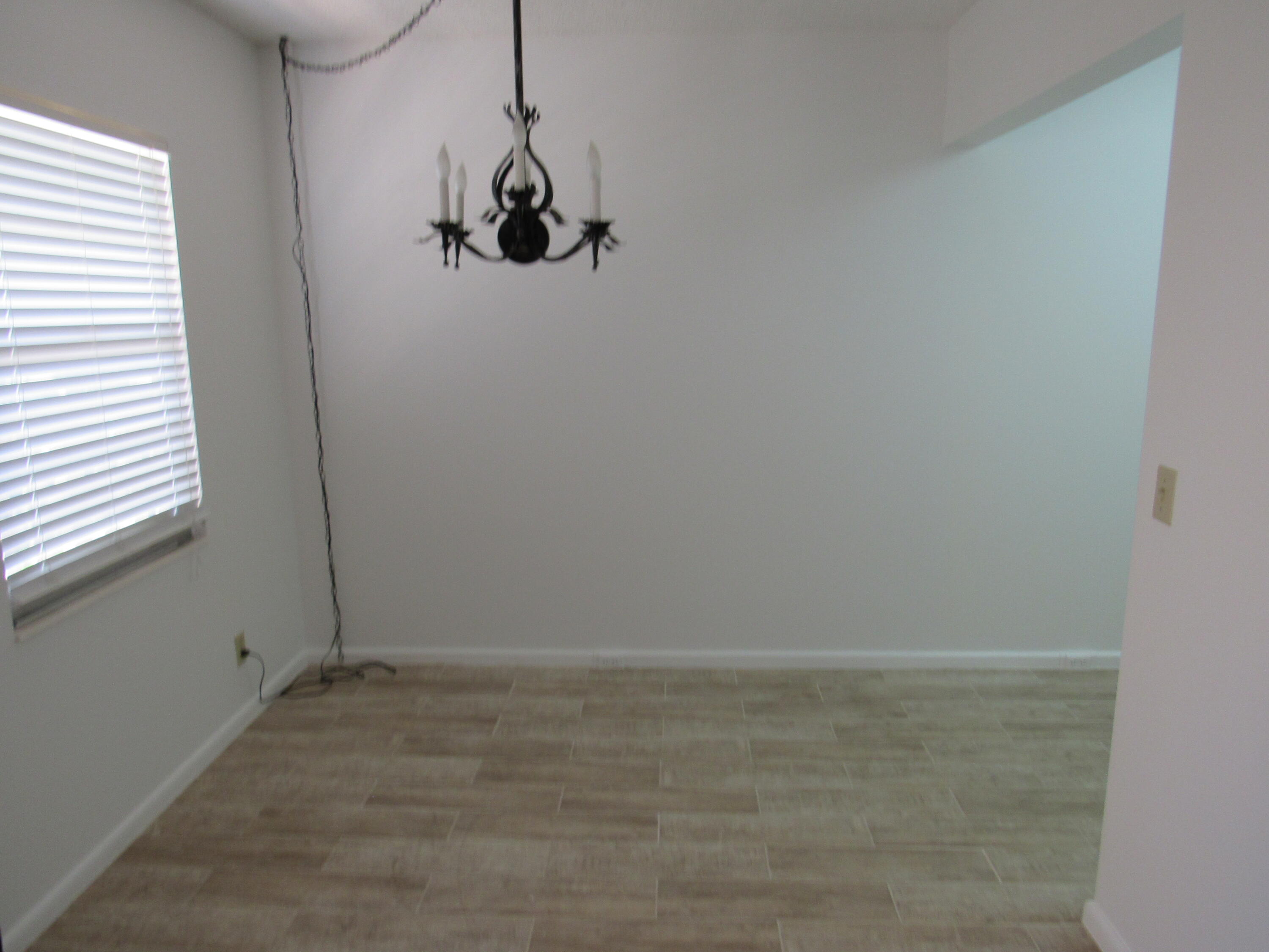 310 Brighton H Boca Raton, FL 33434 - Photo 9 of 41 a view of a room with rack on the wall