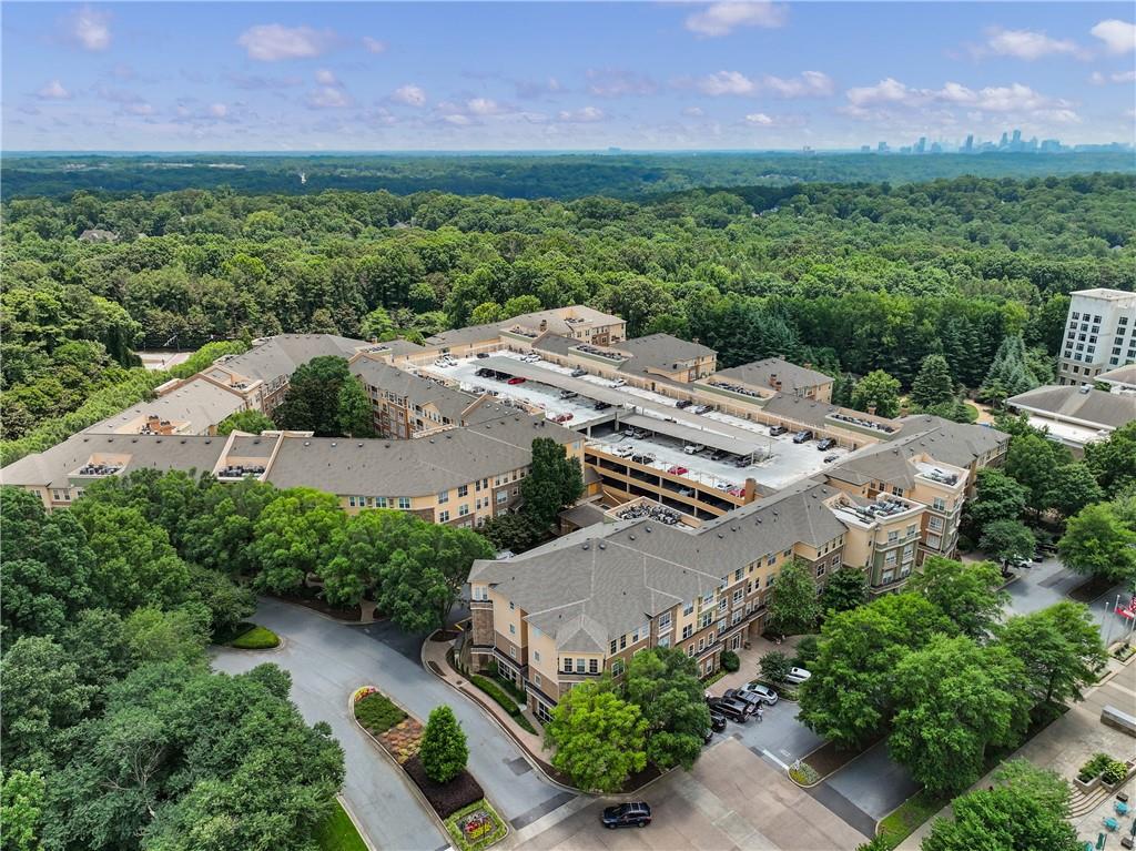 10 Perimeter Summit Boulevard, Unit 3311 Atlanta, GA 30319 - Photo 43 of 68 an aerial view of a house with a garden and a yard