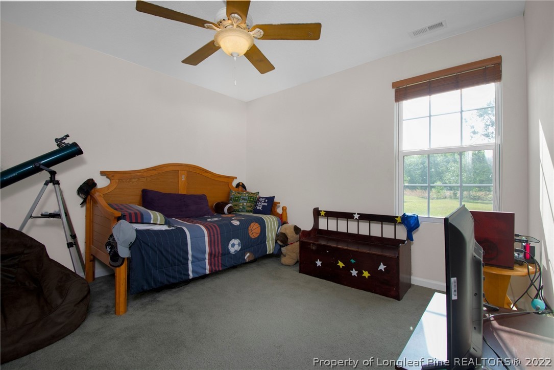 166 Hayden Road Fairmont, NC 28340 - Photo 21 of 37 a bedroom with bed and a window