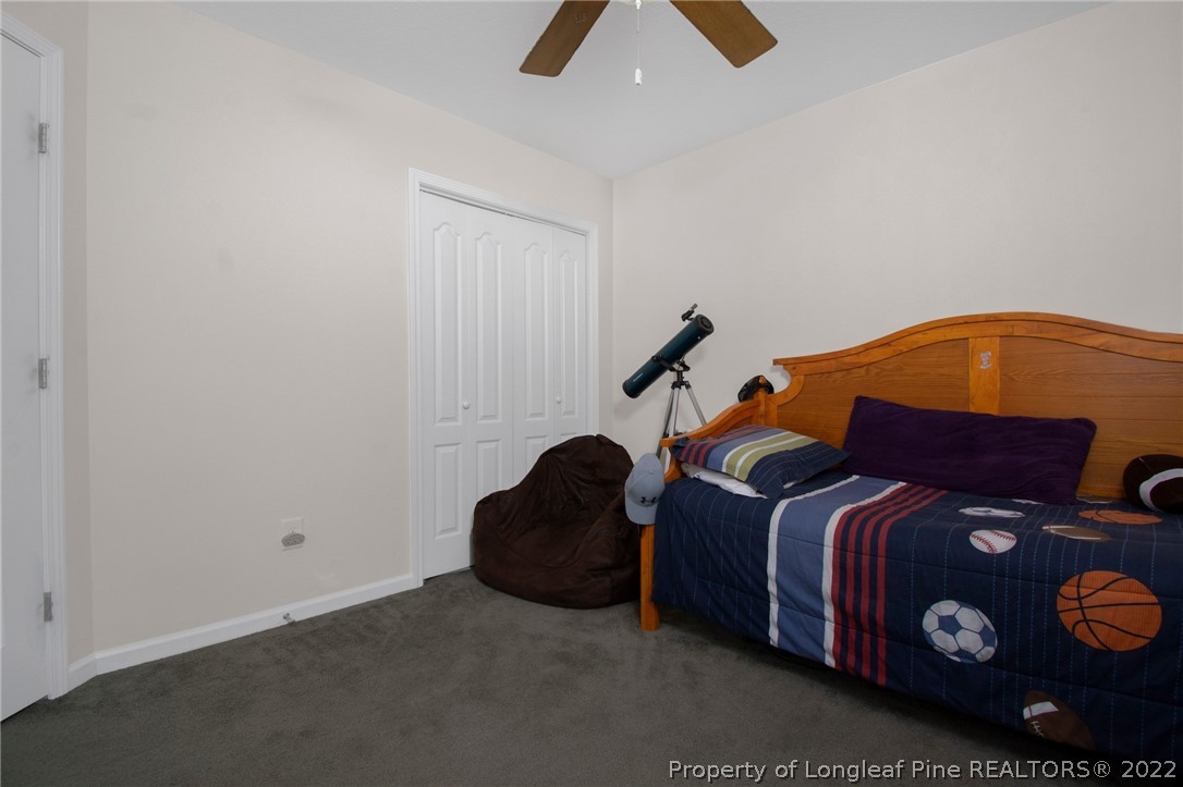 166 Hayden Road Fairmont, NC 28340 - Photo 22 of 37 a bedroom with a bed and a closet