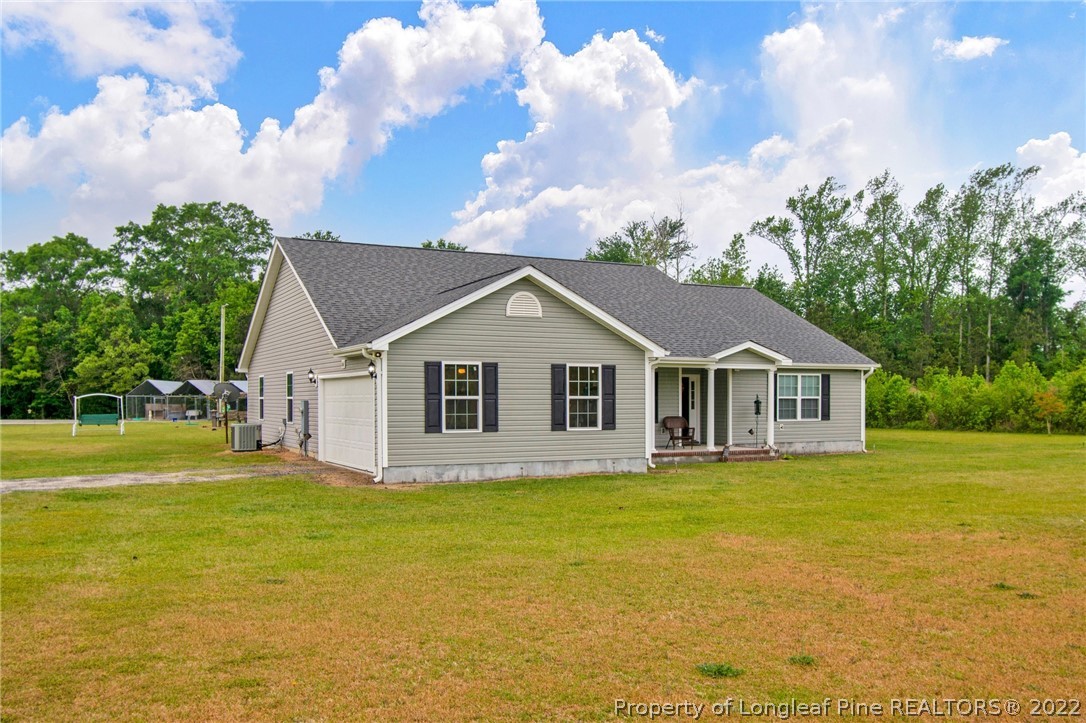 166 Hayden Road Fairmont, NC 28340 - Photo 3 of 37 a front view of house with yard and green space