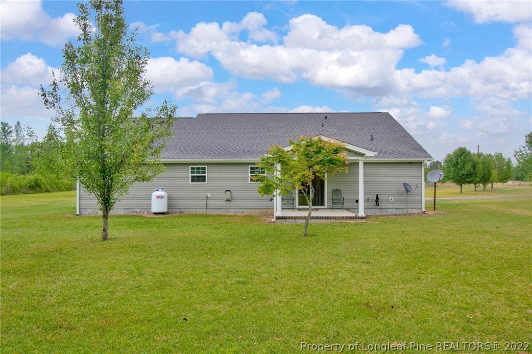 166 Hayden Road Fairmont, NC 28340 - Photo 32 of 37 a front view of house with yard and trees