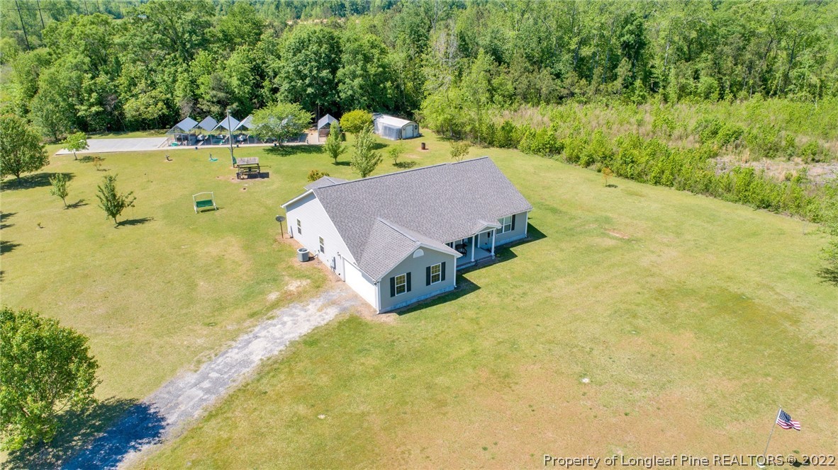 166 Hayden Road Fairmont, NC 28340 - Photo 37 of 37 a view of a swimming pool with a yard