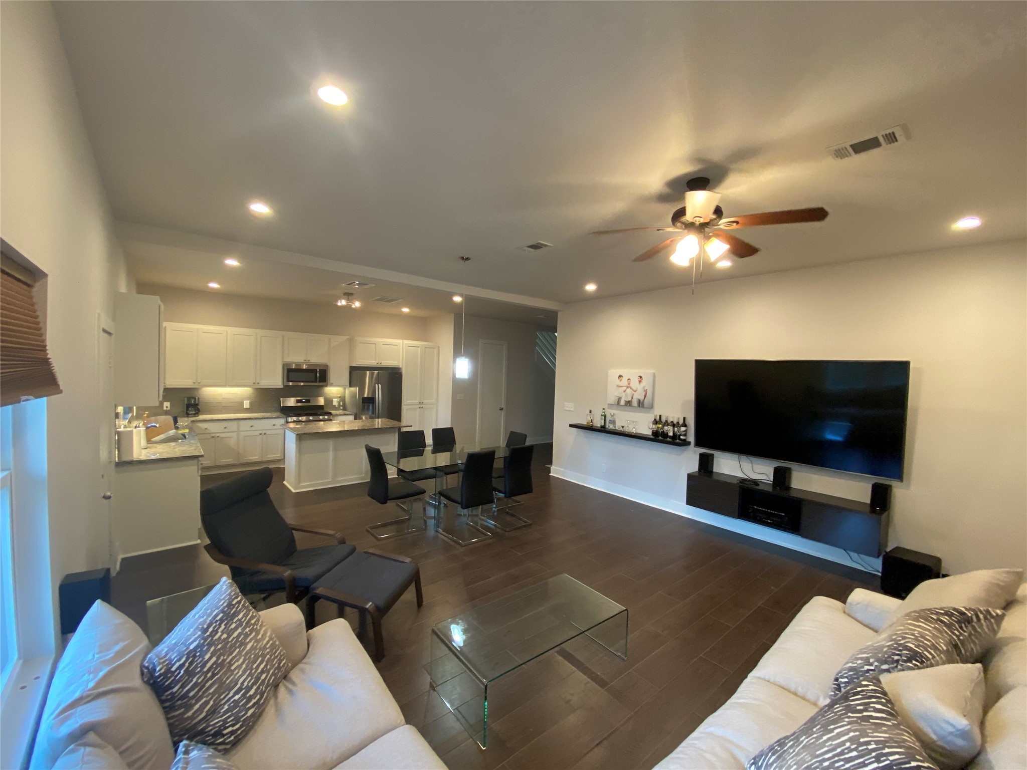 9737 Fabiola Drive Houston, TX 77075 - Photo 2 of 9 a living room with furniture and a flat screen tv