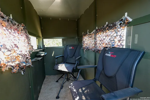 a room with furniture and garden view