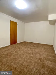 an empty room with a workbench