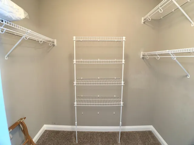a view of a room with racks on the wall