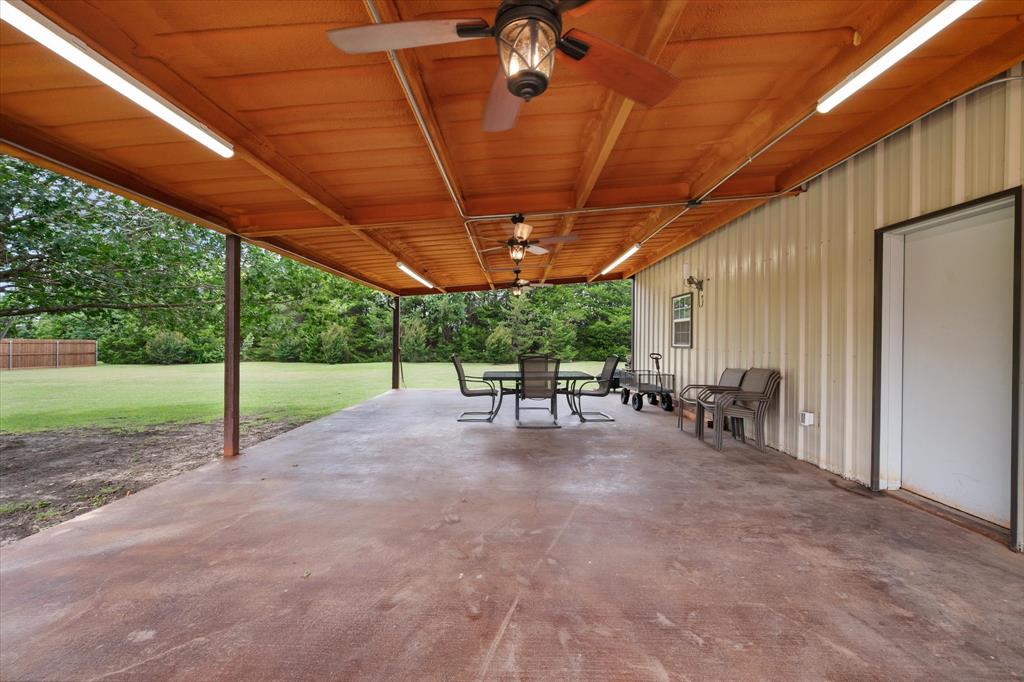 413 Rugged Drive Red Oak, TX 75154 - Photo 31 of 39 Massive covered patio off the shop