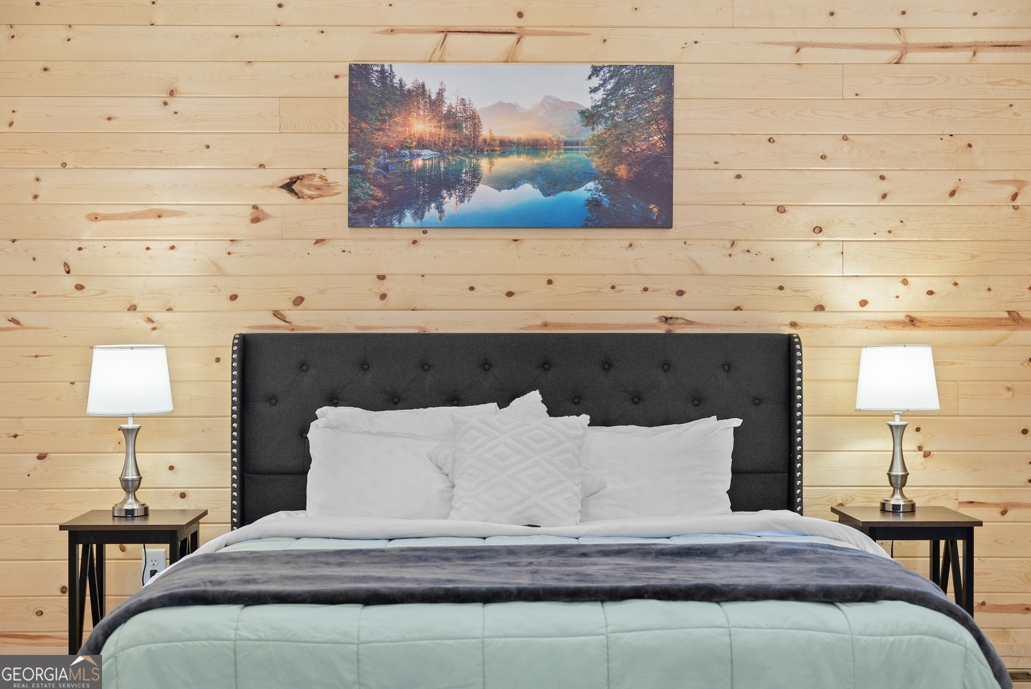 339 Hickory Ridge Drive Cleveland, GA 30528 - Photo 14 of 54 a large bed sitting in a bedroom next to a mirror