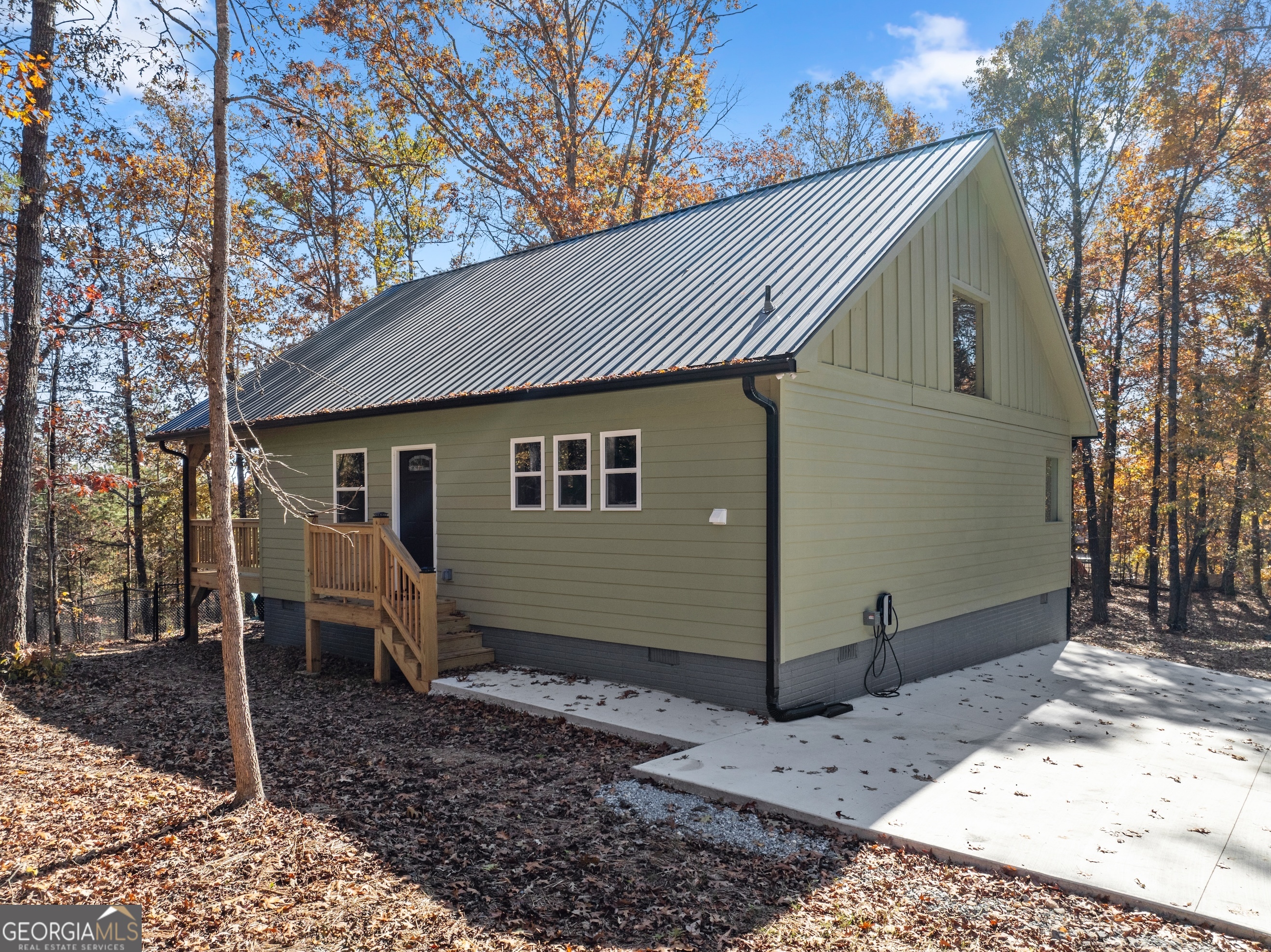 339 Hickory Ridge Drive Cleveland, GA 30528 - Photo 2 of 54 a front view of a house with garden