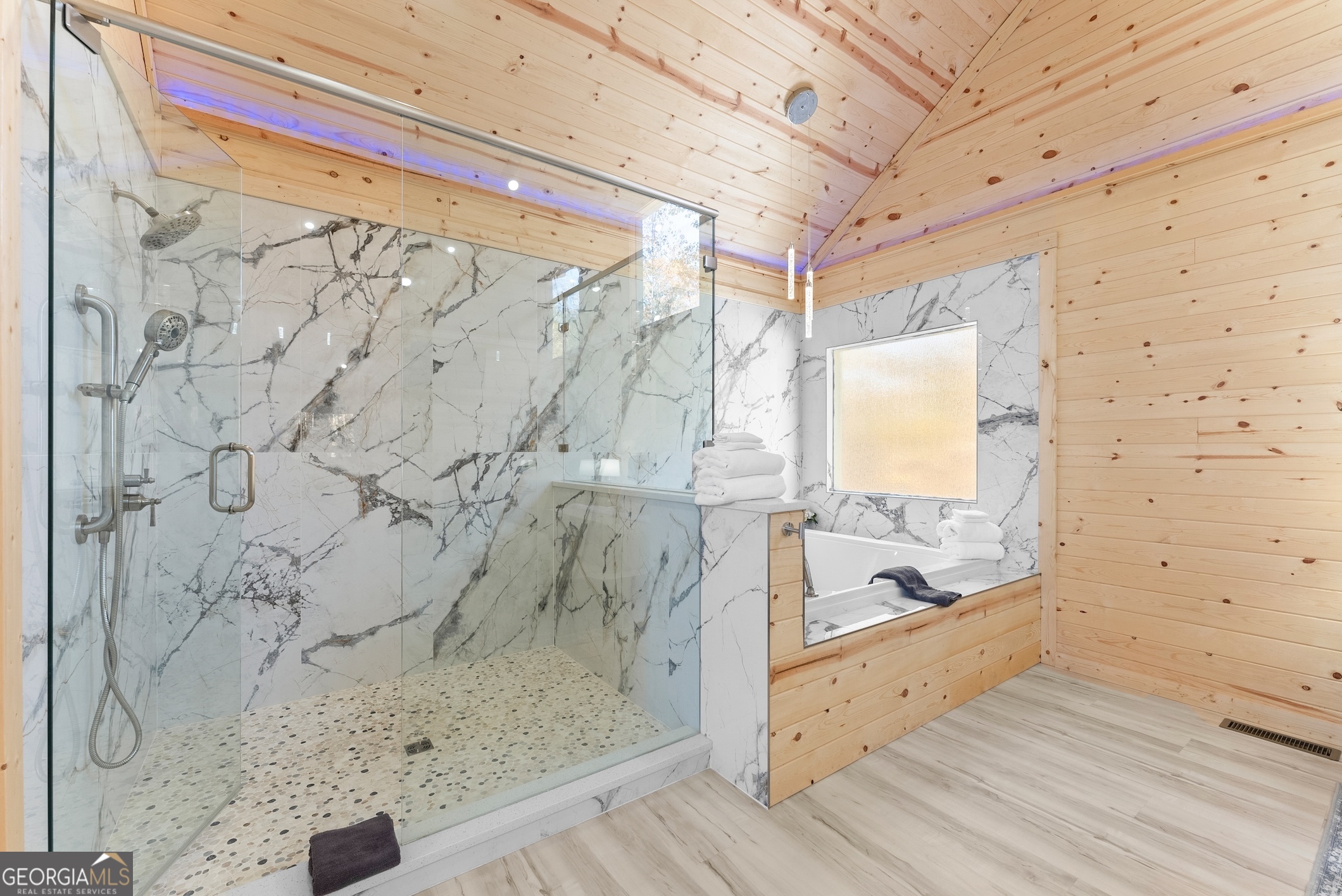 339 Hickory Ridge Drive Cleveland, GA 30528 - Photo 22 of 54 a bathroom with a bathtub and a shower