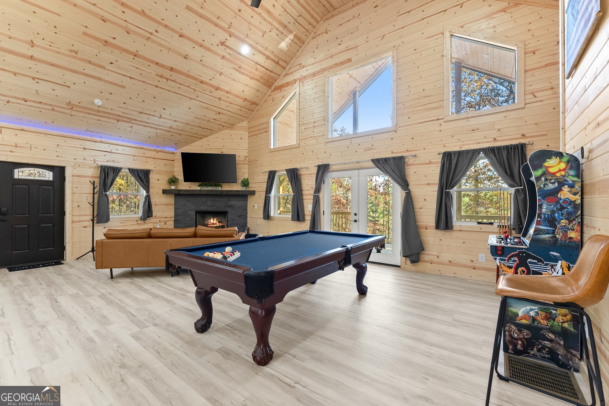 339 Hickory Ridge Drive Cleveland, GA 30528 - Photo 25 of 54 a living room with furniture a rug and a fireplace