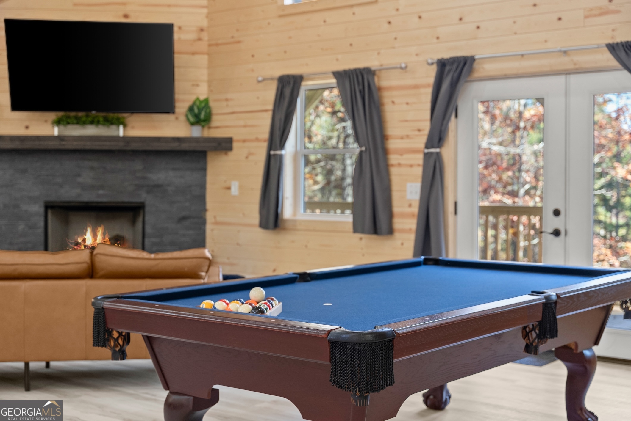 339 Hickory Ridge Drive Cleveland, GA 30528 - Photo 31 of 54 a living room with furniture fireplace and flat screen tv