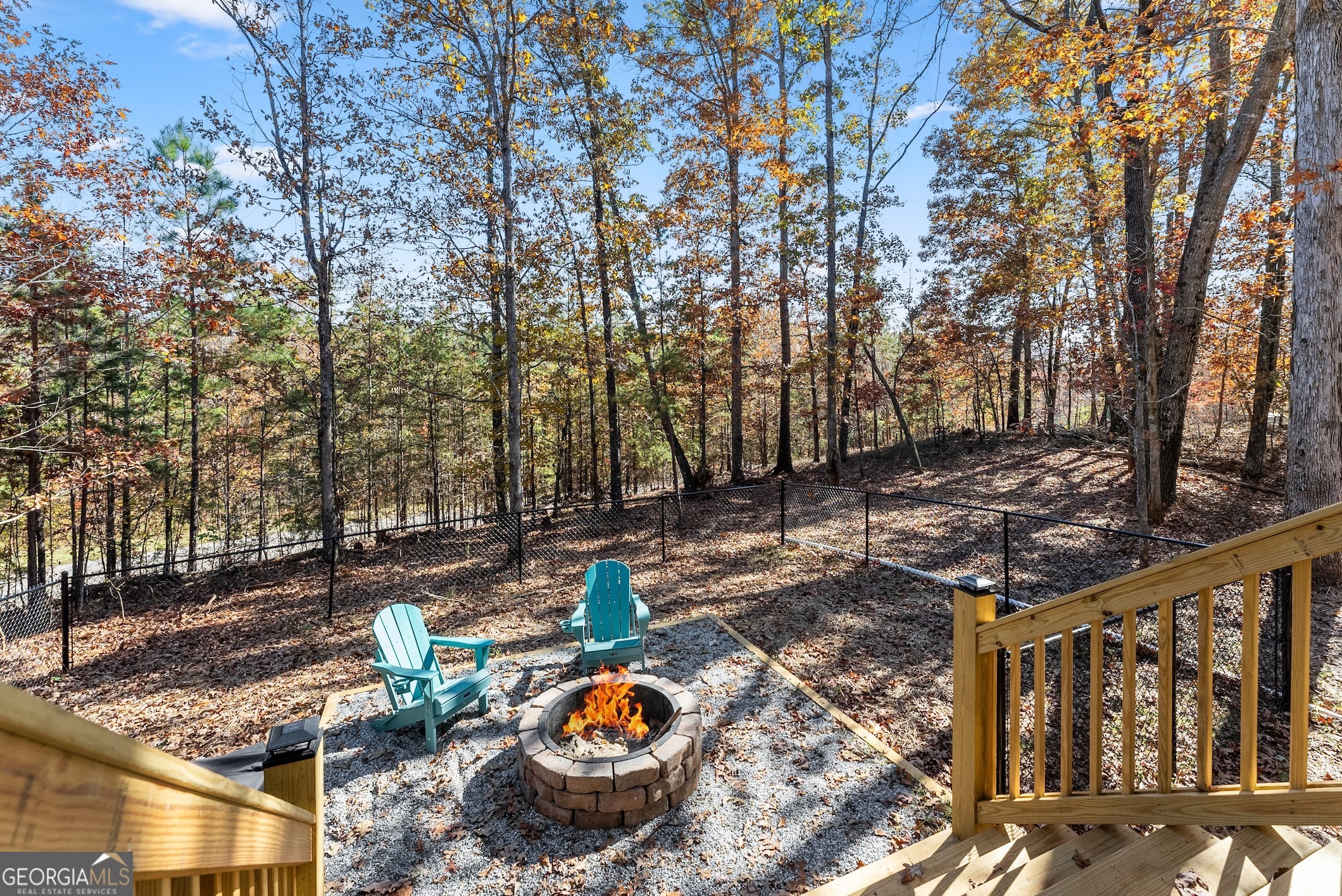 339 Hickory Ridge Drive Cleveland, GA 30528 - Photo 44 of 54 a view of a wooden chairs with fire pit