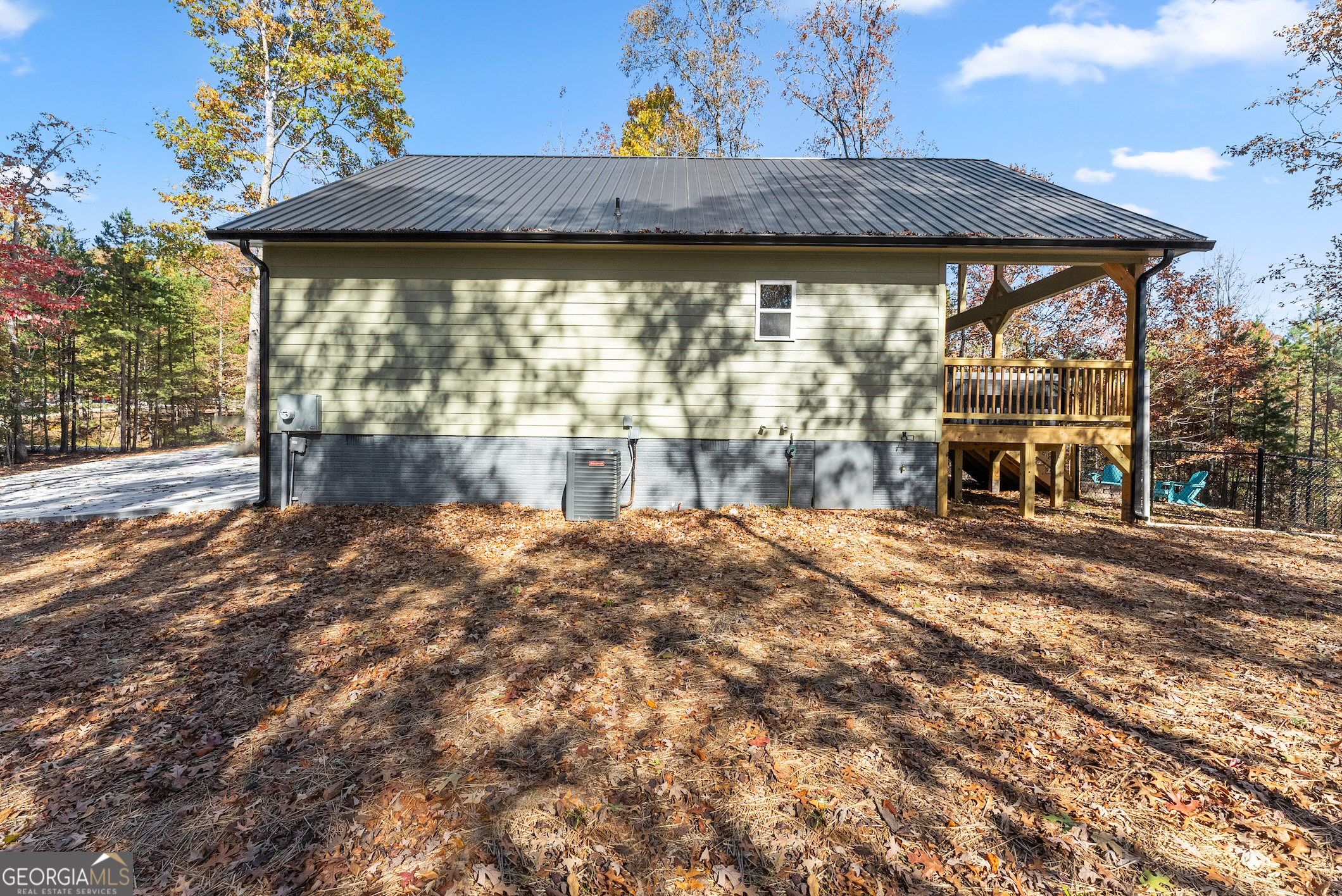 339 Hickory Ridge Drive Cleveland, GA 30528 - Photo 48 of 54 a view of a backyard with a deck and a garden