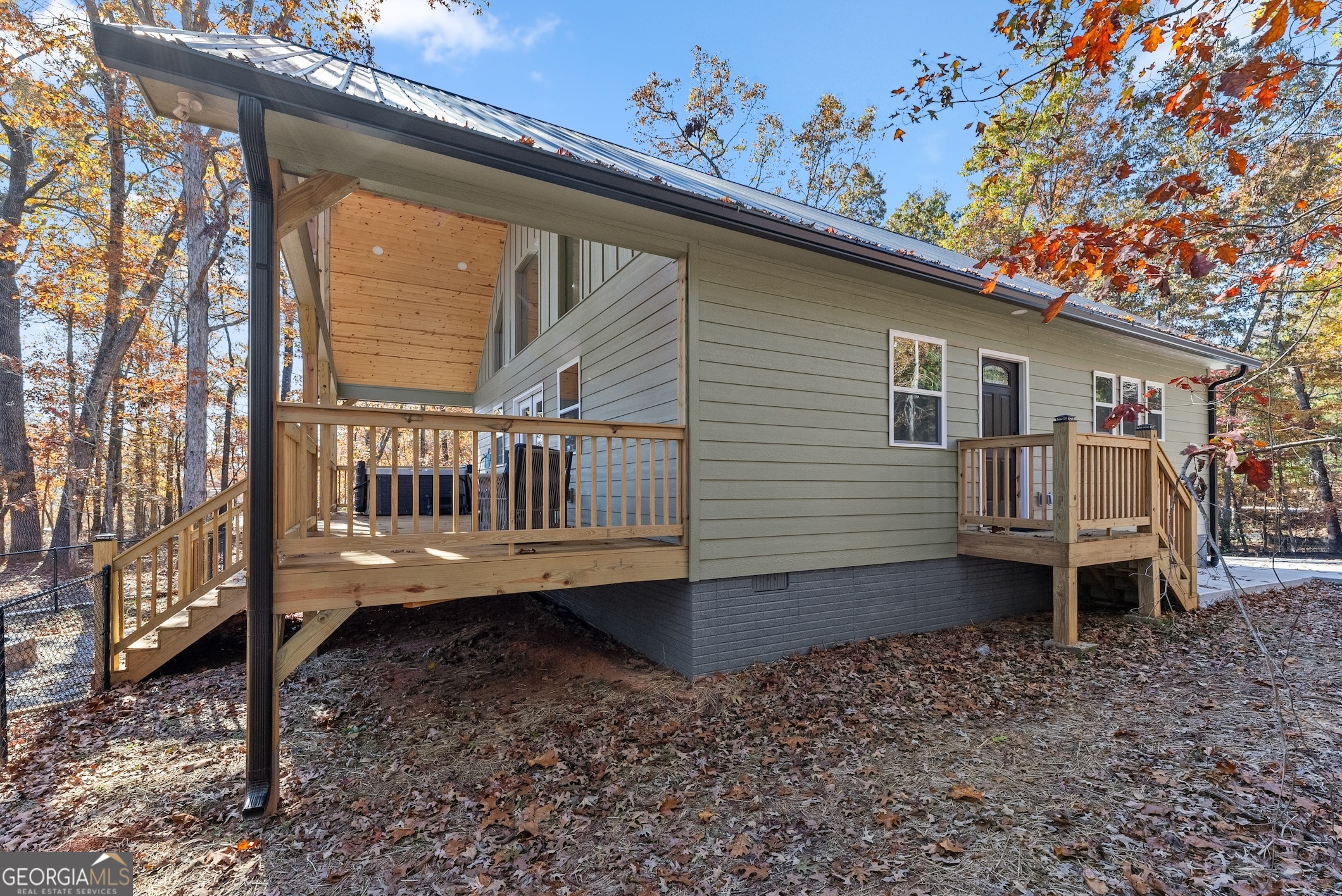 339 Hickory Ridge Drive Cleveland, GA 30528 - Photo 50 of 54 a view of a house with a yard and deck