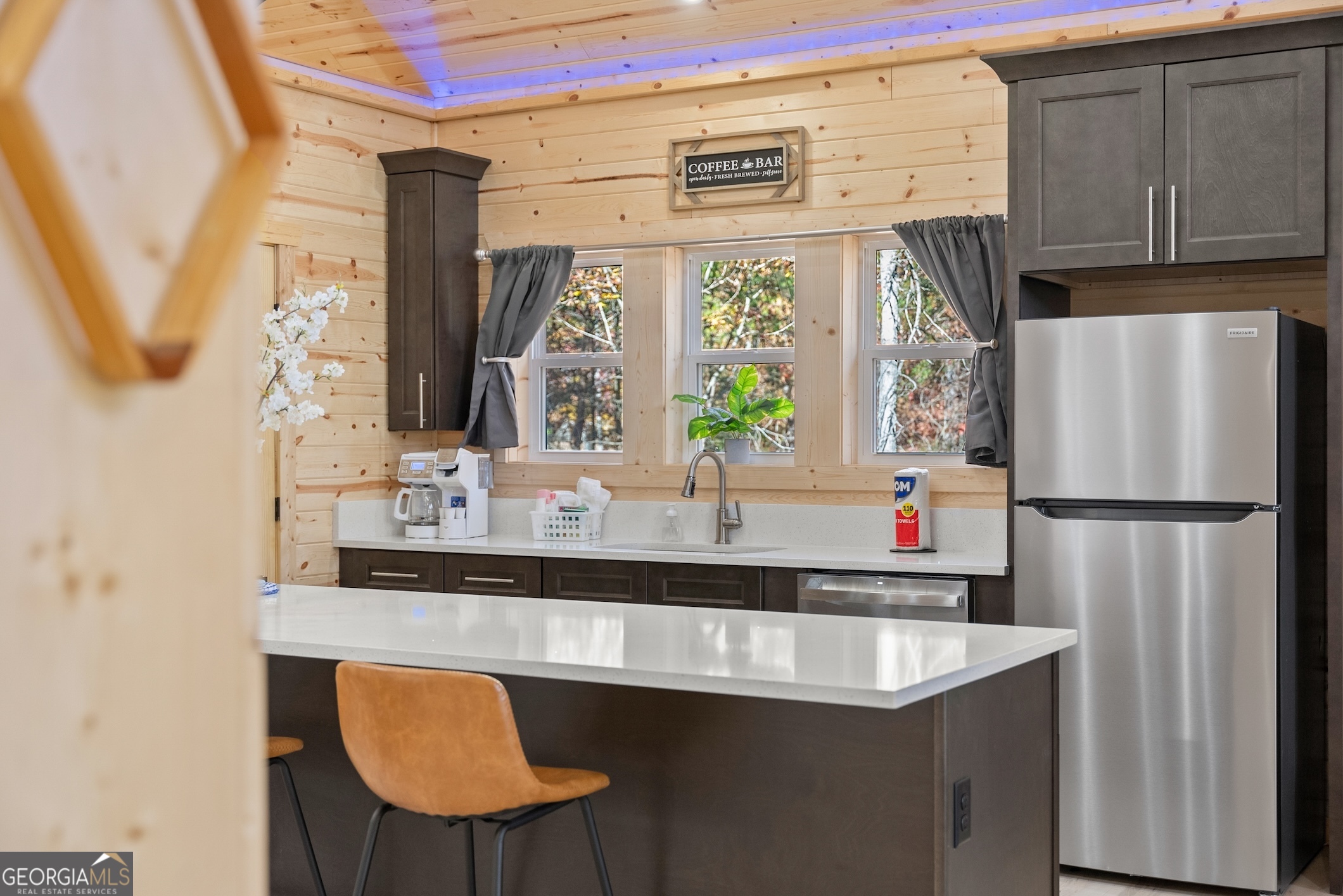 339 Hickory Ridge Drive Cleveland, GA 30528 - Photo 5 of 54 a kitchen with stainless steel appliances a sink and a large window