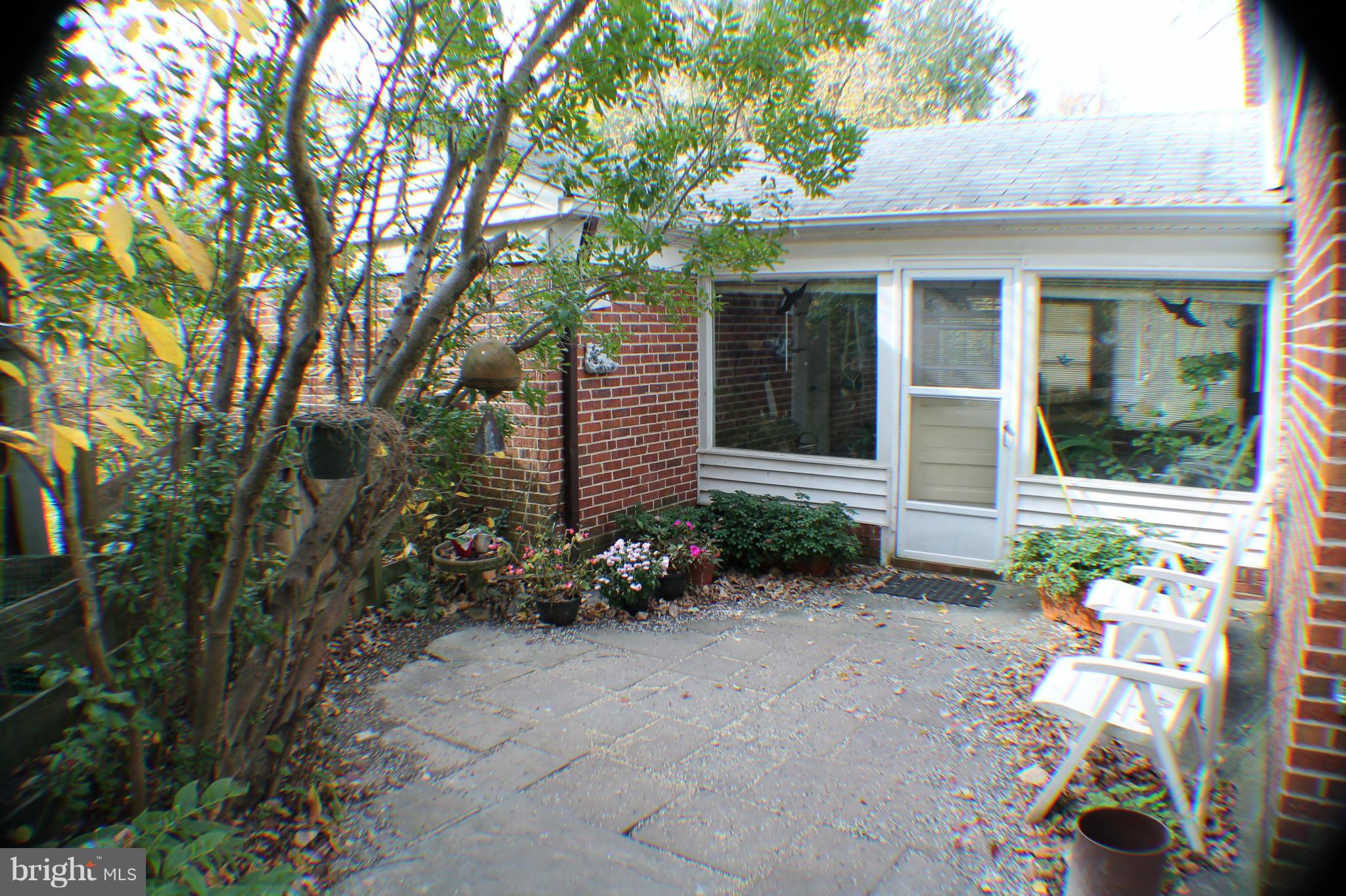 7205 Prince George Road Pikesville, MD 21207 - Photo 17 of 20 a front view of a house with a yard