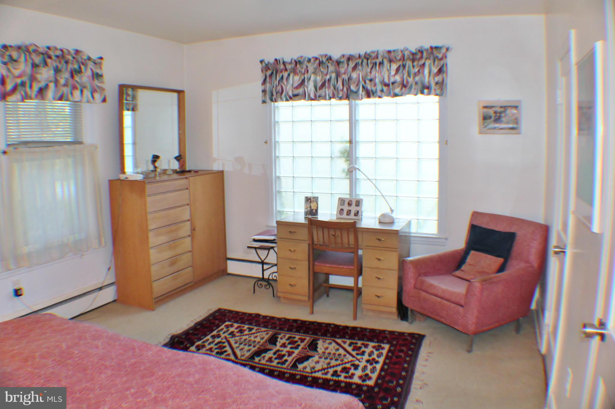 7205 Prince George Road Pikesville, MD 21207 - Photo 9 of 20 a living room with furniture and a window