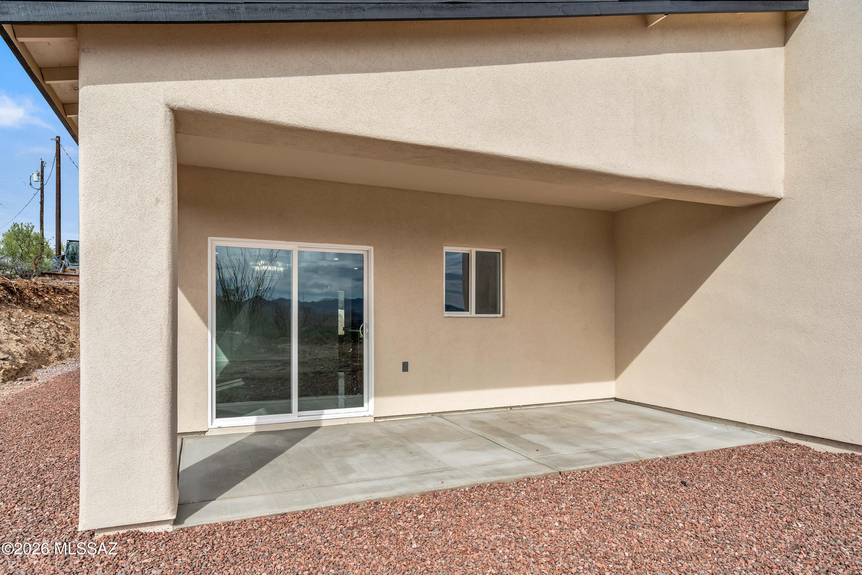 1834 Circulo Glorieta Rio Rico, AZ 85648 - Photo 35 of 35 a view of a house with a door and wooden roof