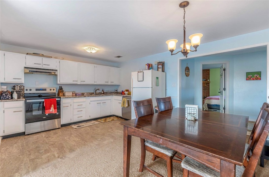 10 Monroe Road Lebanon, OH 45036 - Photo 5 of 14 Bright and open kitchen with ample counter space and appliances, perfect for everyday living.