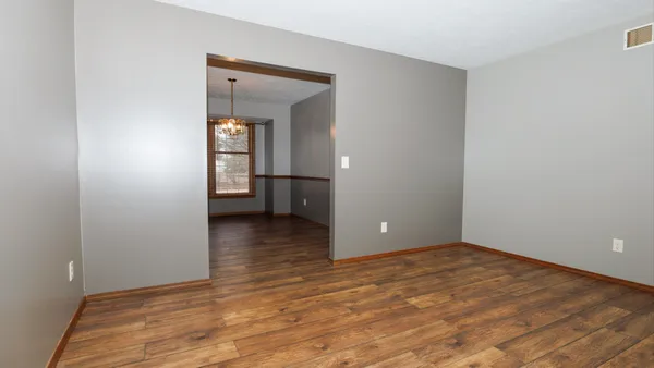 an empty room with windows