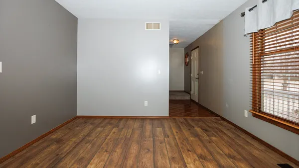 an empty room with windows
