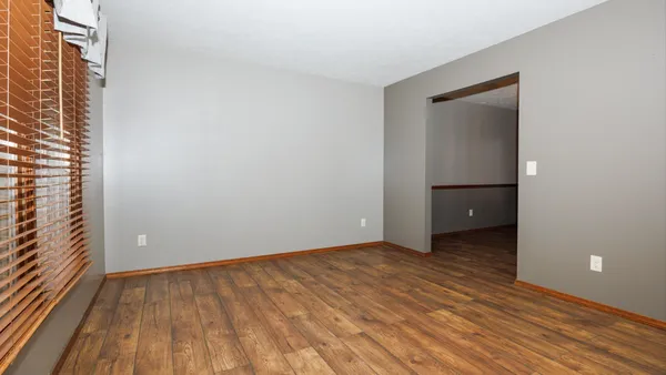 an empty room with windows