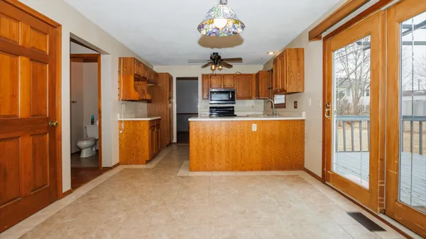 a very nice looking kitchen with a large window