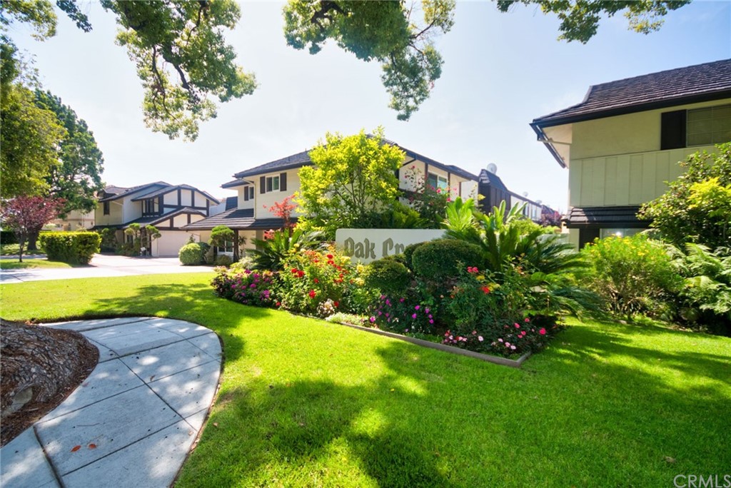 1140 Arcadia Avenue, Unit H Arcadia, CA 91007 - Photo 42 of 46 a view of a house with a big yard plants and large trees