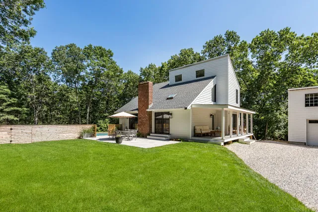 a front view of house with garden