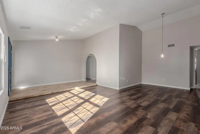a view of an empty room and window