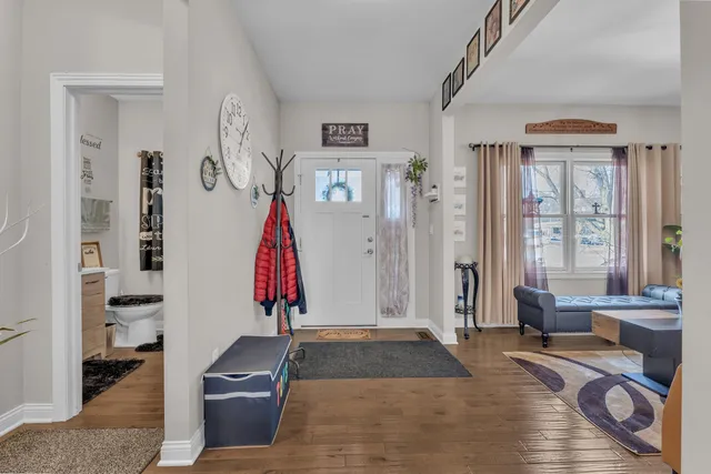a kitchen with a sink appliances and cabinets