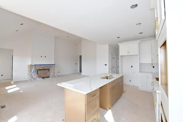 a kitchen with cabinets and sink