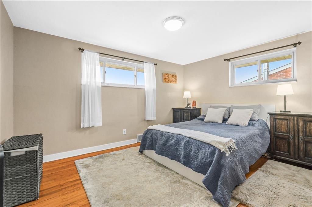 1654 Hollyrood Road Pittsburgh, PA 15227 - Photo 11 of 33 a bedroom with a bed and a couch