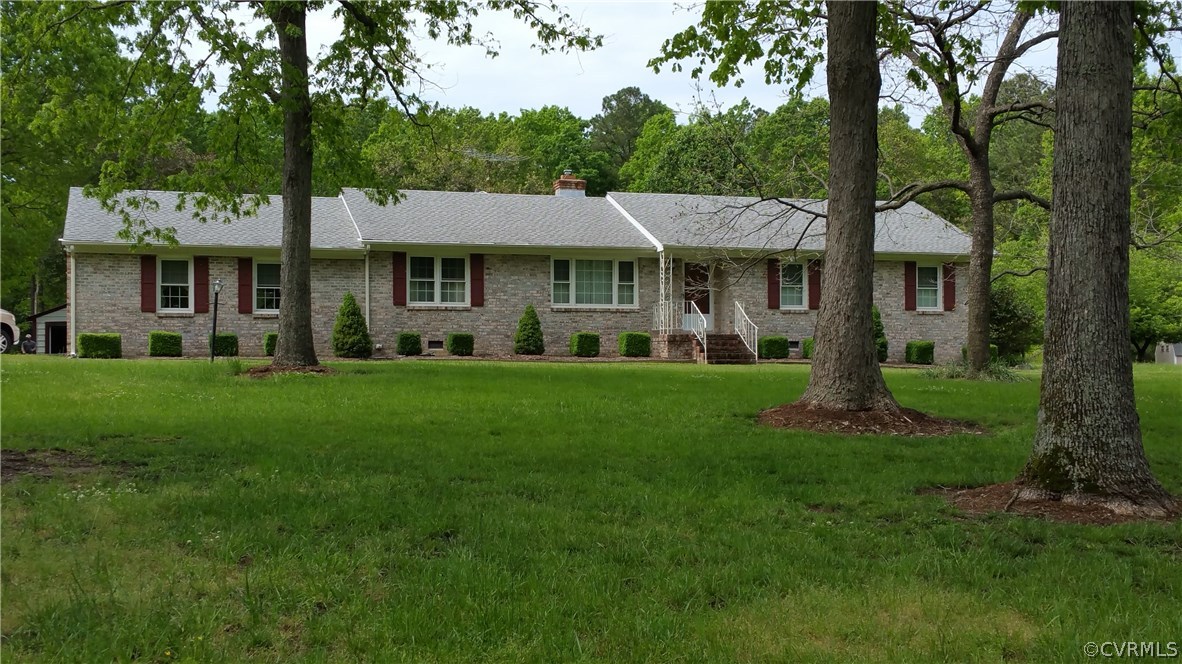 12620 Spring Run Road Chesterfield, VA 23832 - Photo 1 of 26 a view of an house with backyard space and garden