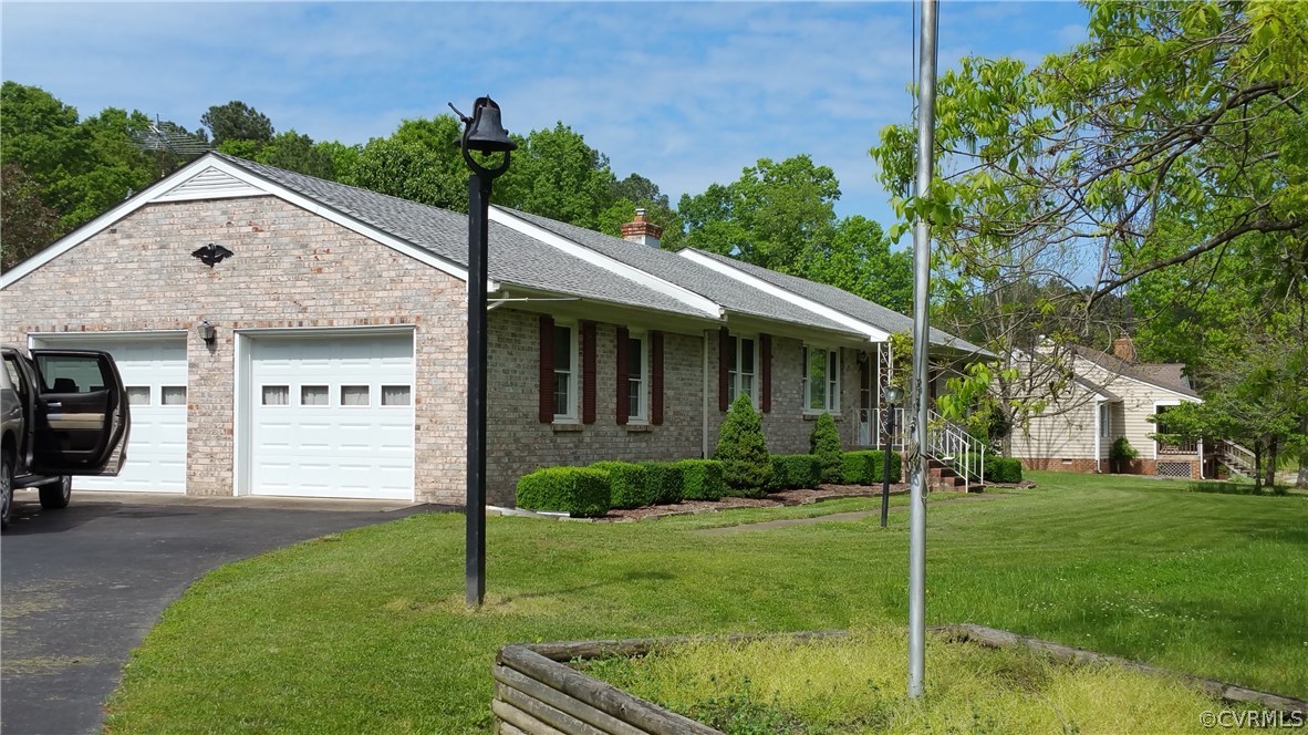 12620 Spring Run Road Chesterfield, VA 23832 - Photo 2 of 26 a view of a house with a yard