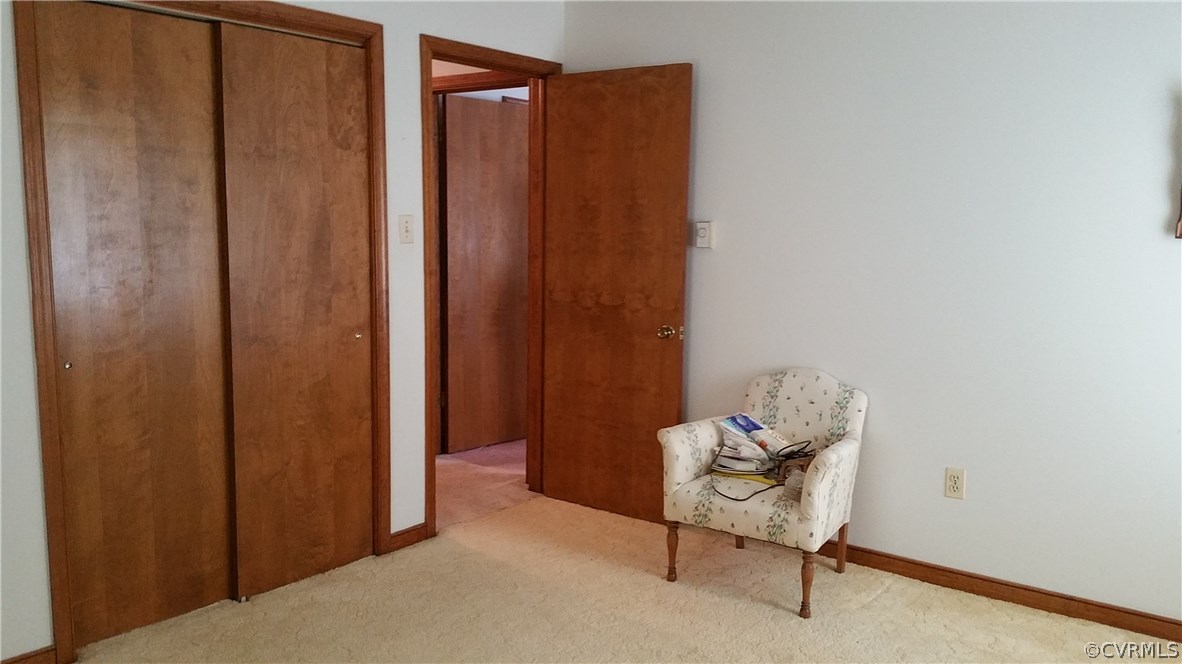 12620 Spring Run Road Chesterfield, VA 23832 - Photo 21 of 26 a bedroom with a bed and a chair