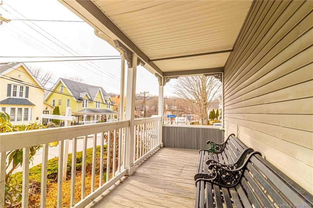 28 Oak Street Norwich, CT 06360 - Photo 1 of 1 a view of a balcony with chairs