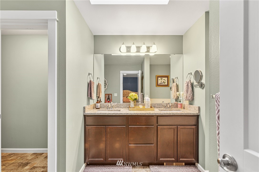 19614 Lerch Road Snohomish, WA 98290 - Photo 16 of 40 a bathroom with a sink and a mirror