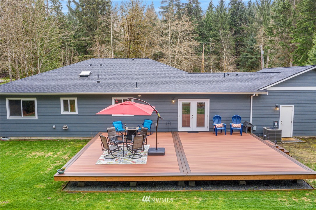 19614 Lerch Road Snohomish, WA 98290 - Photo 27 of 40 a view of a house with a yard chairs and table