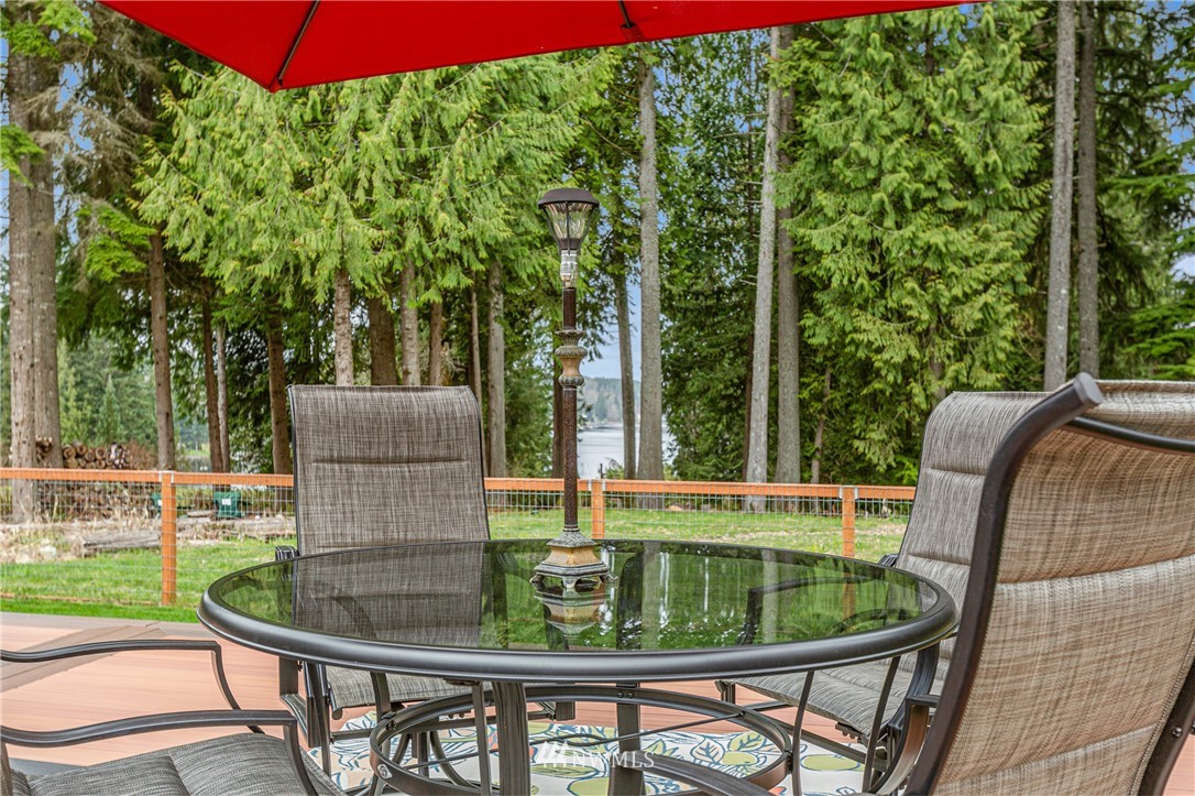 19614 Lerch Road Snohomish, WA 98290 - Photo 31 of 40 a patio with table and chairs