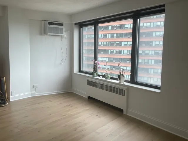 a kitchen with a stove and a refrigerator