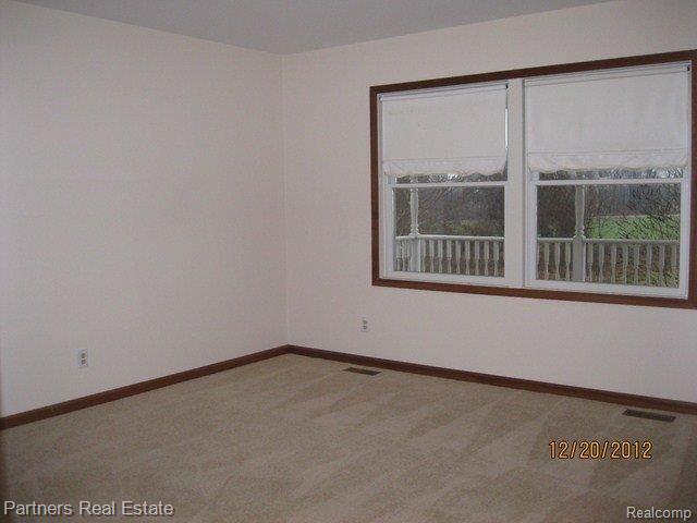 7303 Clyde Road Fenton, MI 48430 - Photo 9 of 15 Master Bedroom