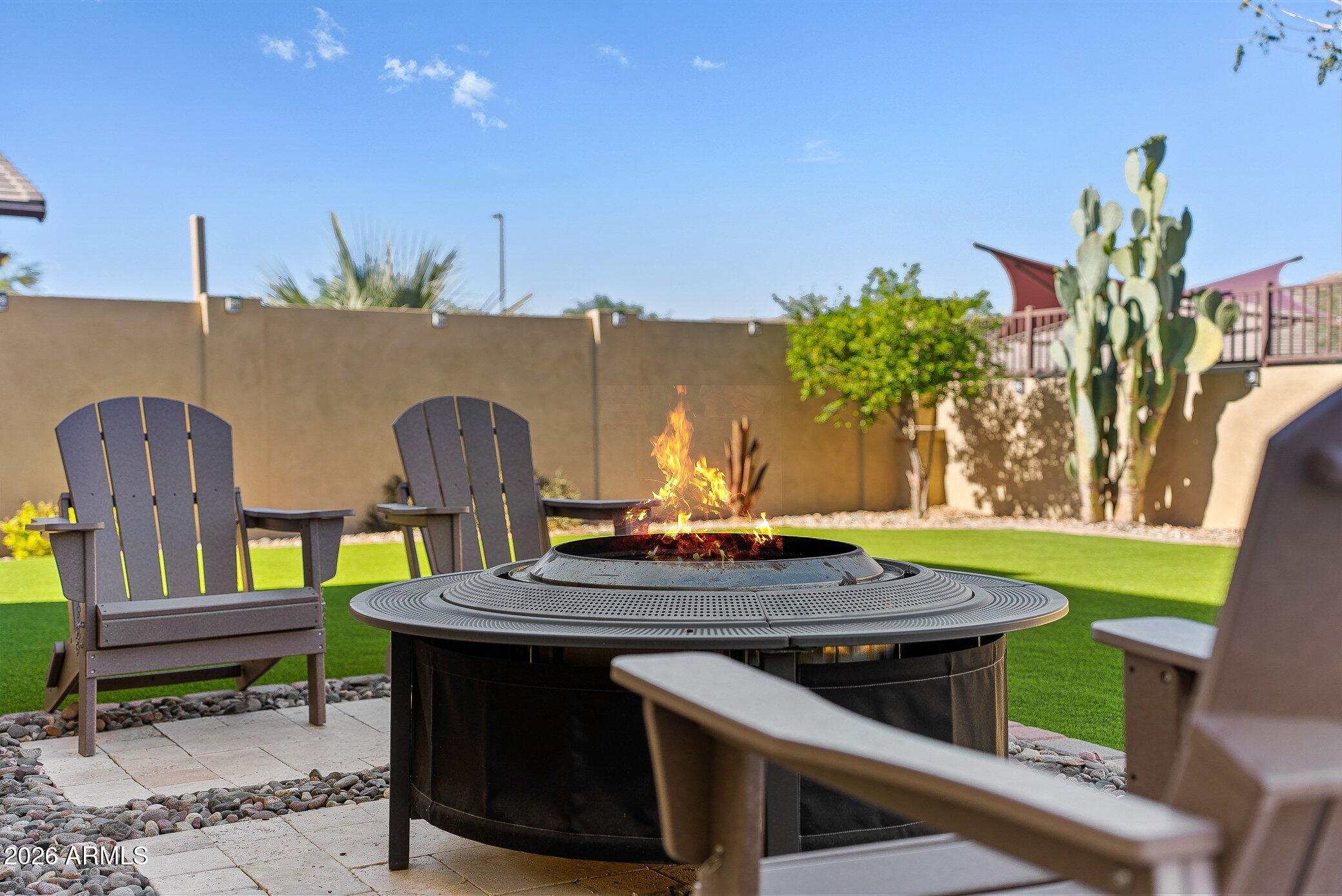 5819 South Wilson Way Gilbert, AZ 85298 - Photo 64 of 76 a view of a chairs and table in patio